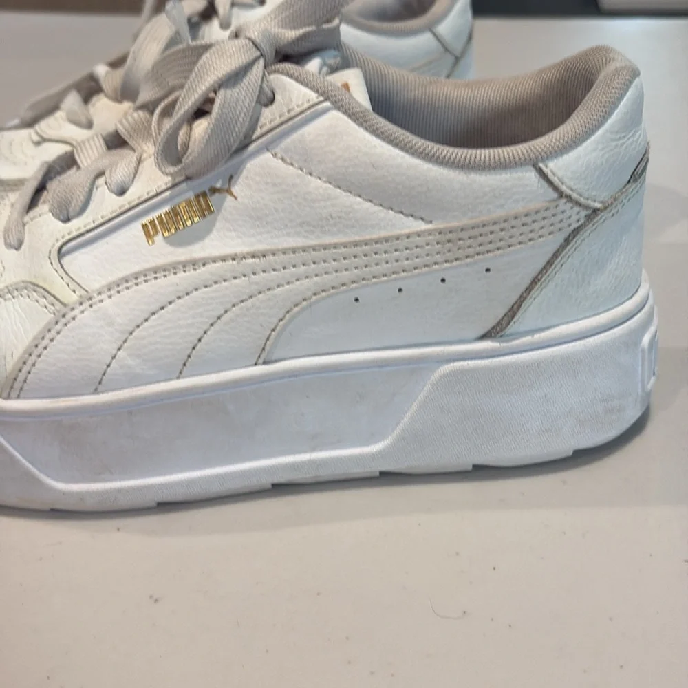 Puma - Karmen Rebelle women’s sneakers.  Platform sole. Size 9.  White